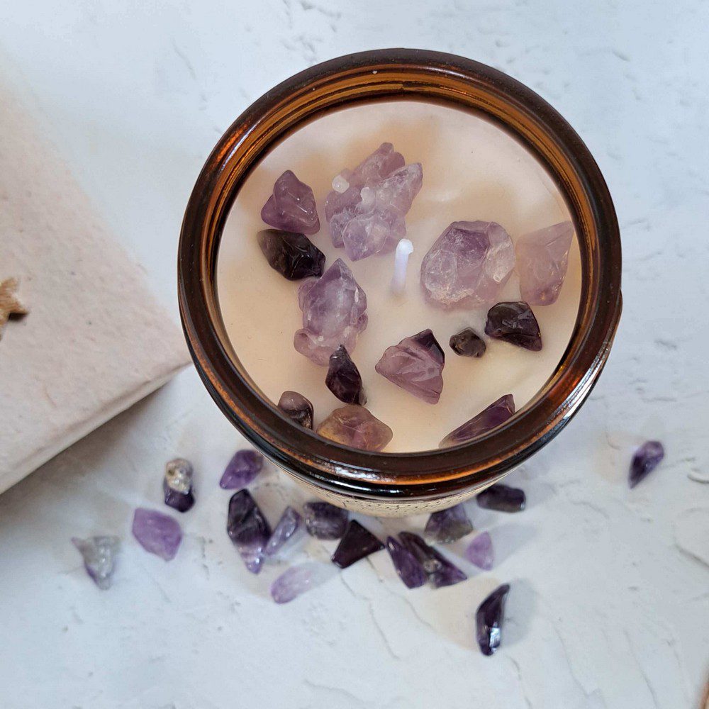 essential oil candle with amethyst crystal chips