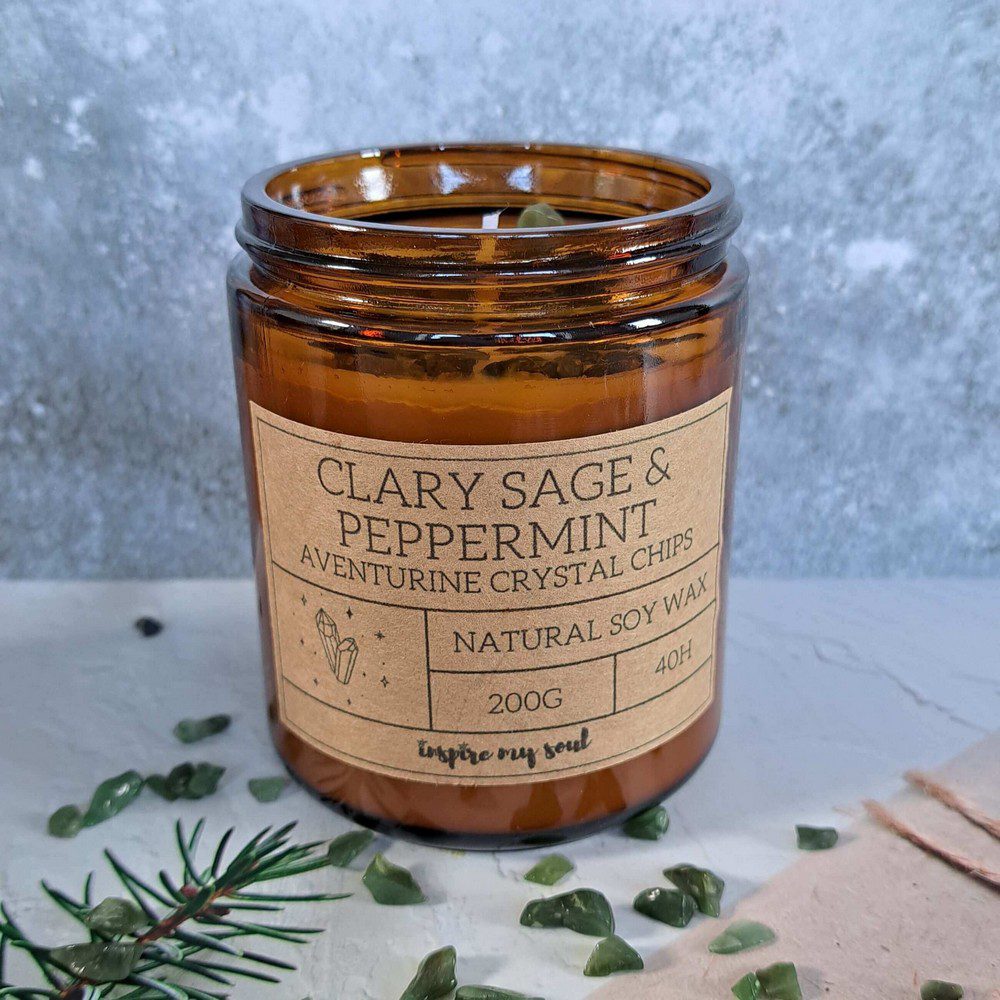 essential oil candle with aventurine crystal chips