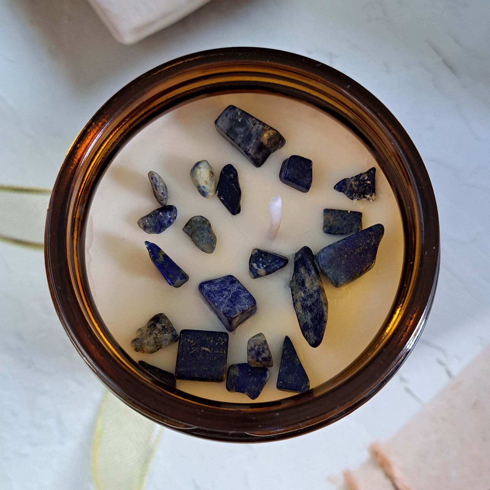 essential oil candle with lapis crystal chips