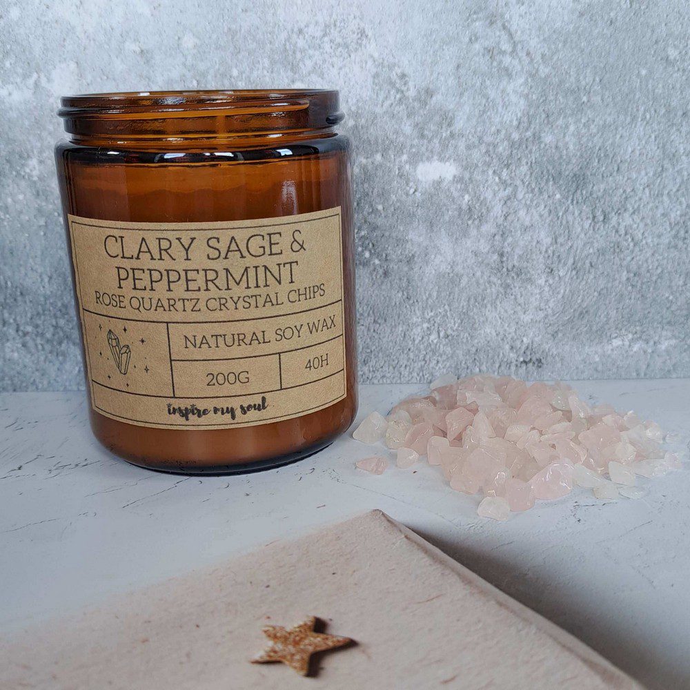 essential oil candle with rose quartz crystal chips