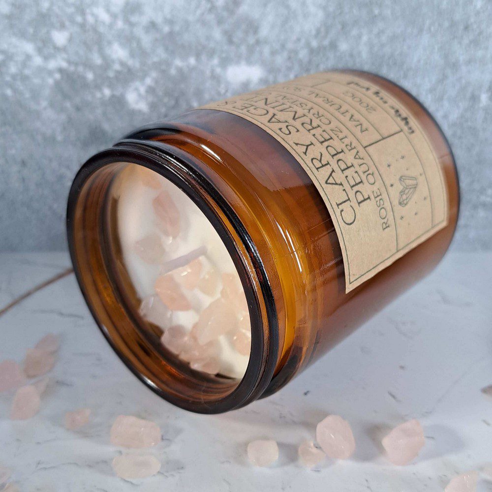 essential oil candle with rose quartz crystal chips