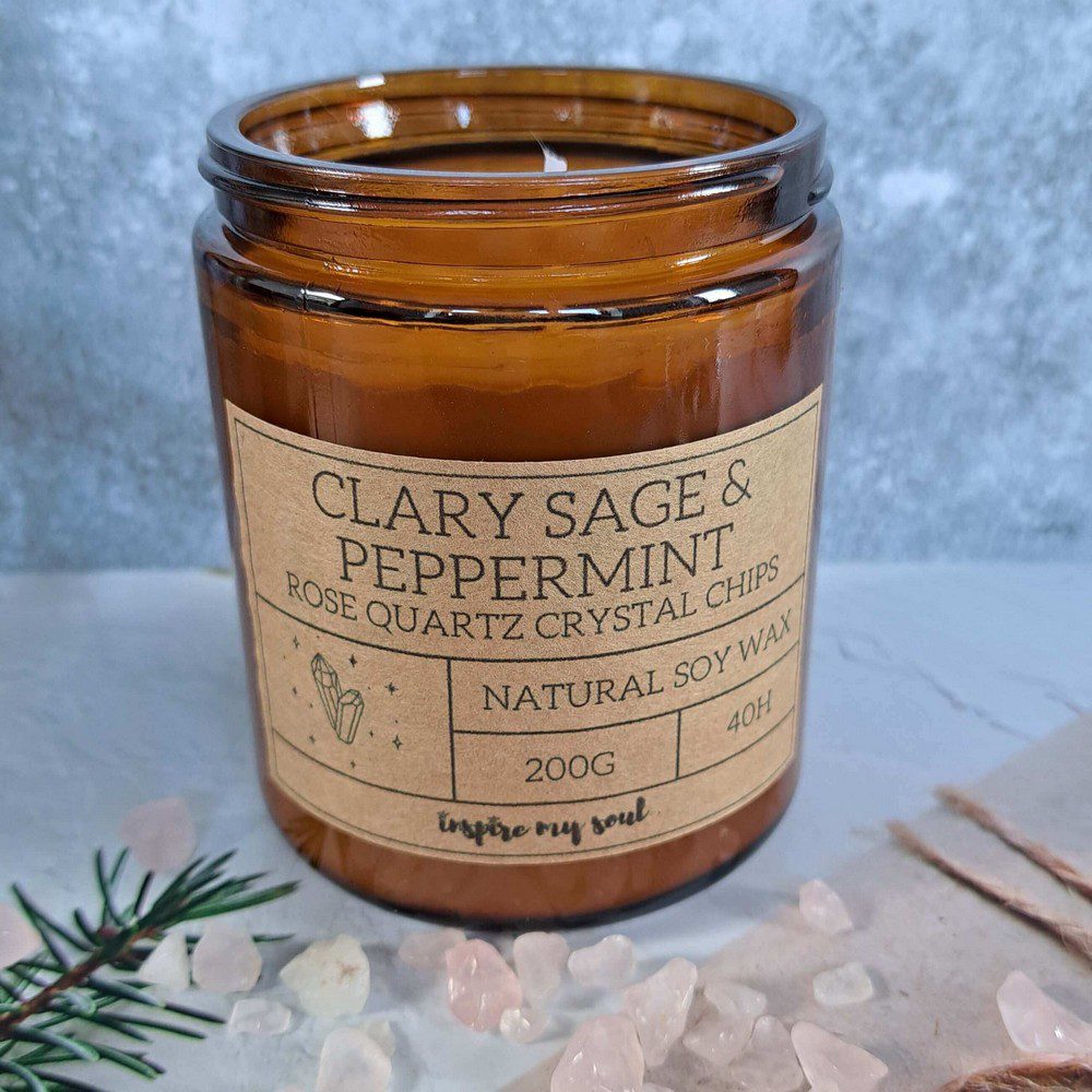 essential oil candle with rose quartz crystal chips